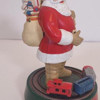 LOT 96 D: Various Santa Figurines