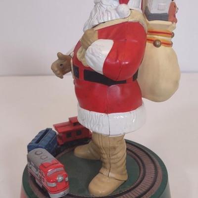LOT 96 D: Various Santa Figurines