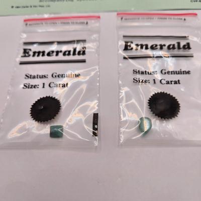 LOT 143L: Two Black Star of India Gems with COA and Two 1 Carat Emeralds with One COA