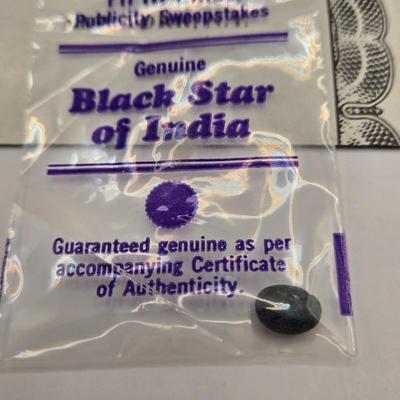 LOT 143L: Two Black Star of India Gems with COA and Two 1 Carat Emeralds with One COA
