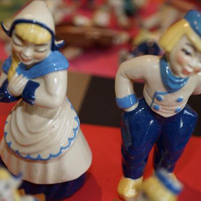 CERAMIC ARTS STUDIO. DUTCH STYLE FIGURINES ONE SET WITH BENCH /ONE PAIR STANDING