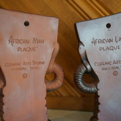 CERAMIC ARTS STUDIO AFRICAN MAN AND LADY WALL PLAQUES