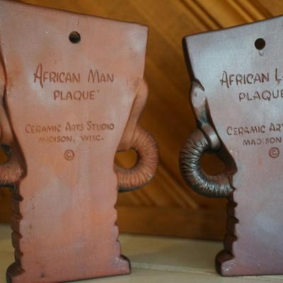 CERAMIC ARTS STUDIO AFRICAN MAN AND LADY WALL PLAQUES