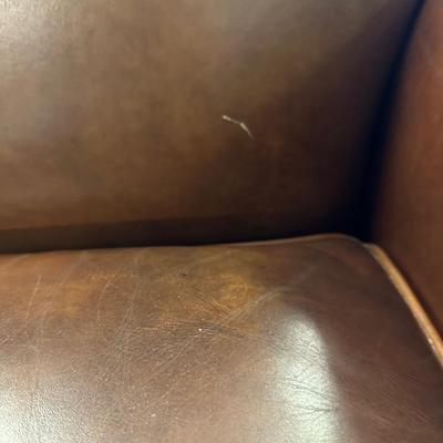 Pair of Leather Hancock and Moore Chairs