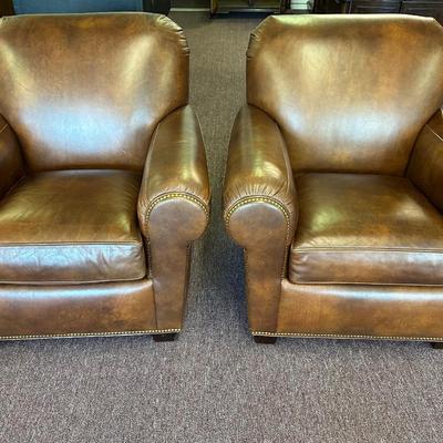 Pair of Leather Hancock and Moore Chairs