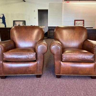 Pair of Leather Hancock and Moore Chairs