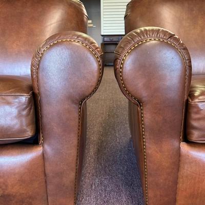 Pair of Leather Hancock and Moore Chairs