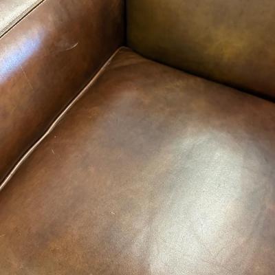 Pair of Leather Hancock and Moore Chairs
