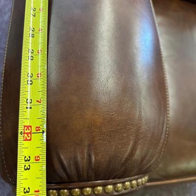 Pair of Leather Hancock and Moore Chairs