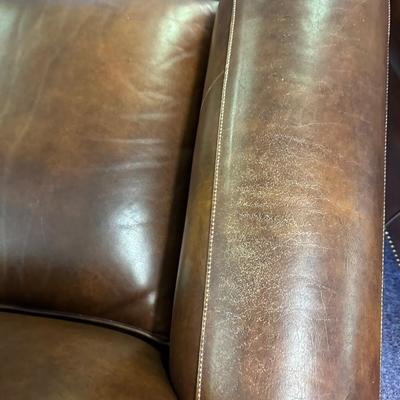 Pair of Leather Hancock and Moore Chairs
