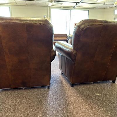 Pair of Leather Hancock and Moore Chairs