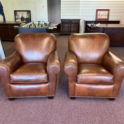 Pair of Leather Hancock and Moore Chairs