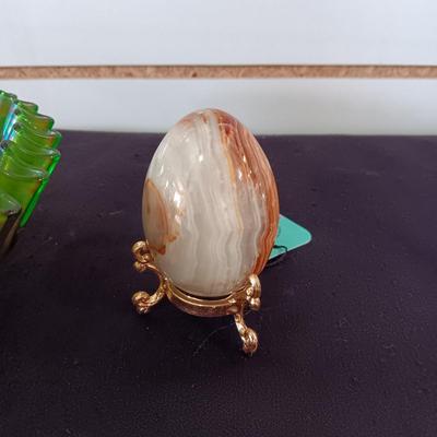 GREEN CARNIVAL GLASS RUFFLED BOWL AND A MARBLE EGG