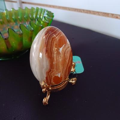 GREEN CARNIVAL GLASS RUFFLED BOWL AND A MARBLE EGG