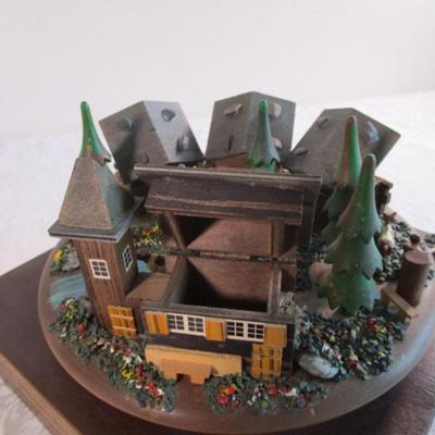 Village scene music box rotates as the music plays