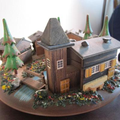 Village scene music box rotates as the music plays