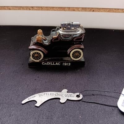 1913 CADILLAC TABLE LIGHTER AND A COCA-COLA BOTTLE OPENER