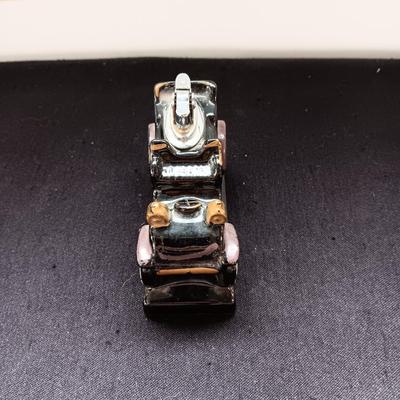 1913 CADILLAC TABLE LIGHTER AND A COCA-COLA BOTTLE OPENER