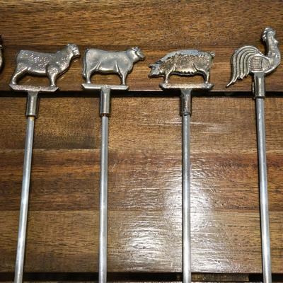 Skewers, Knife Sharpener Strap and Wet Stone, and a Swedish Meat Butchering Tool