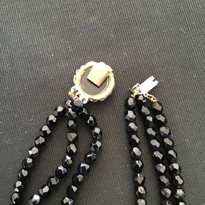 Vintage, three strand faceted glass necklace