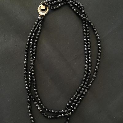 Vintage, three strand faceted glass necklace