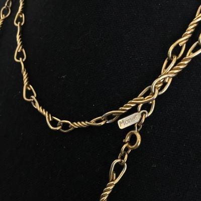 Vintage Monet, gold toned long twisted metal necklace