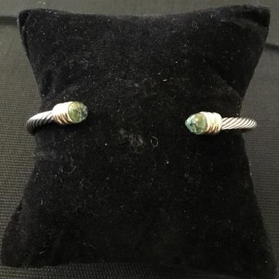 Silver toned cable wire cuff bracelet with rhinestone ends