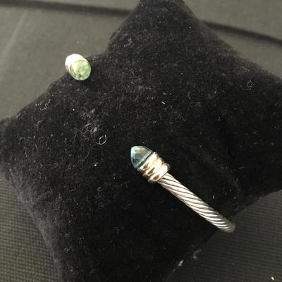 Silver toned cable wire cuff bracelet with rhinestone ends