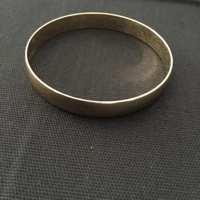 Gold tone bangle bracelet