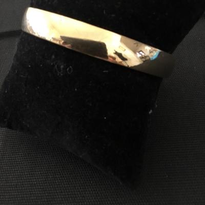 Gold tone bangle bracelet