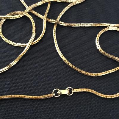 Vintage extra long, gold tone, flapper style necklace