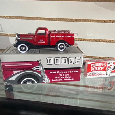 1936 DIE CAST DODGE TANKER TRUCK COIN BANK AND VINTAGE NIB SNOOPY’S HARP