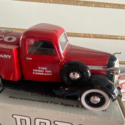 1936 DIE CAST DODGE TANKER TRUCK COIN BANK AND VINTAGE NIB SNOOPY’S HARP
