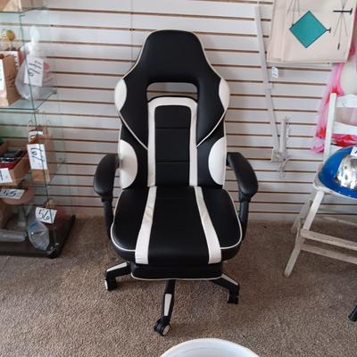 LIKE NEW RECLINING GAMING CHAIR WITH BUILT IN OTTOMAN