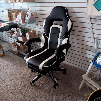 LIKE NEW RECLINING GAMING CHAIR WITH BUILT IN OTTOMAN