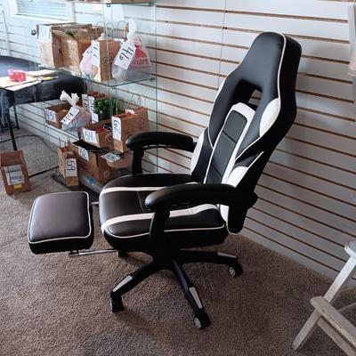 LIKE NEW RECLINING GAMING CHAIR WITH BUILT IN OTTOMAN