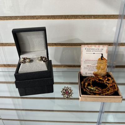 VINTAGE SILVER TONE PURPLE STONE SCREW ON EARRINGS, RETRO GOLD STARBURST ADJUSTABLE RING AND AMBER NECKLACE BY MAZUKNA