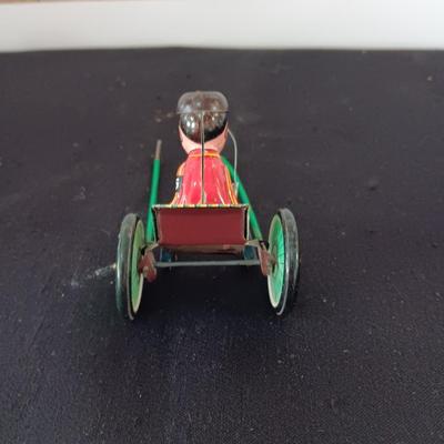 TIN ARMY STAFF CAR AND A JOCKEY IN A CART (WHO LOST HIS HORSE)