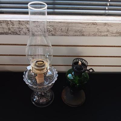 CLEAR FILIGREE AND GREEN GLASS OIL LAMPS