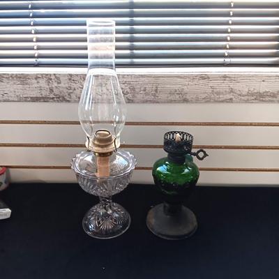 CLEAR FILIGREE AND GREEN GLASS OIL LAMPS