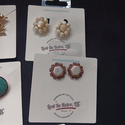 CLIP ON EARRINGS AND BROOCHES