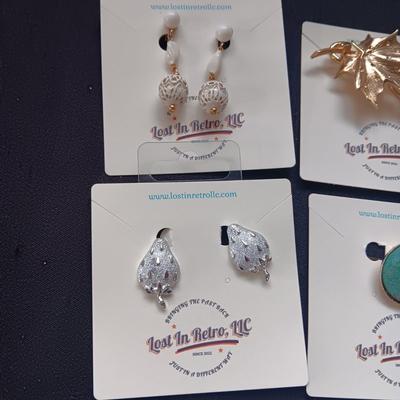 CLIP ON EARRINGS AND BROOCHES