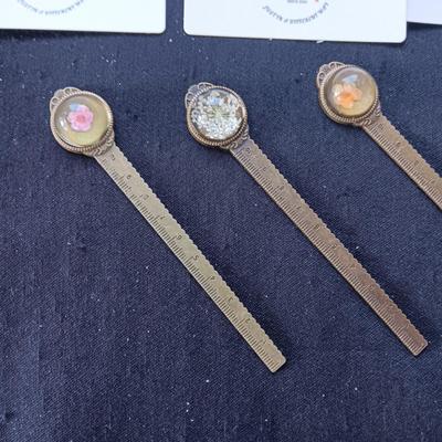 CLIP ON EARRINGS, BROOCHES AND LETTER OPENERS