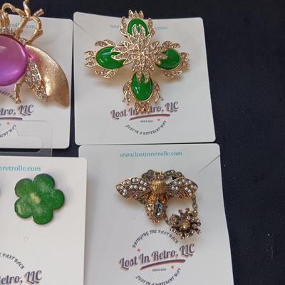 CLIP ON EARRINGS, BROOCHES AND LETTER OPENERS
