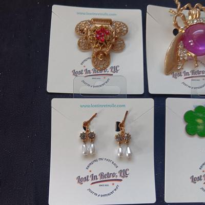 CLIP ON EARRINGS, BROOCHES AND LETTER OPENERS