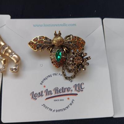 BROOCHES AND LETTER OPENERS