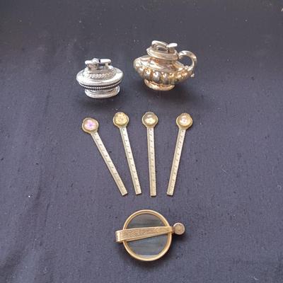2 TABLE LIGHTERS, LETTER OPENERS AND FOLDING BRASS MAGNIFYING GLASS