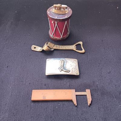 TABLE LIGHTER, BRASS BOTTLE OPENER, BELT BUCKLE AND SLIDING MEASURE