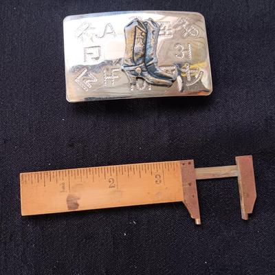 TABLE LIGHTER, BRASS BOTTLE OPENER, BELT BUCKLE AND SLIDING MEASURE