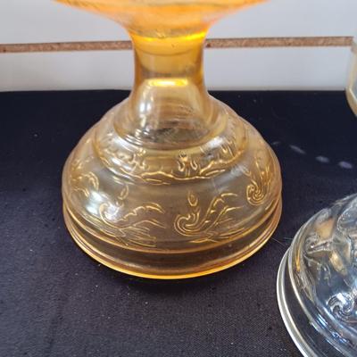 AMBER AND CLEAR GLASS OIL LAMPS